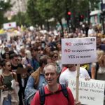 Tens of thousands of anti-lockdown protesters march on London in biggest demo yet.