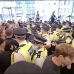 Anti-vaxxers storm London HQ of ITV News and Channel 4 News: Angry mob chases Jon Snow then orders terrified staff to 'get me Peston' before trying to invade Google office nearby