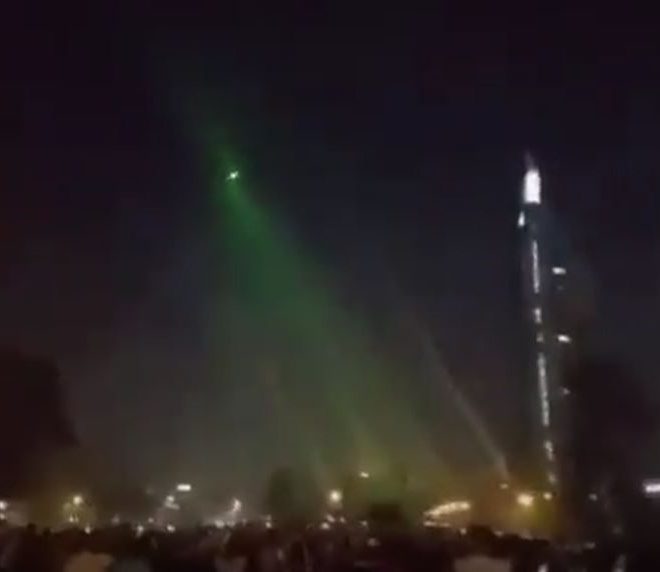 IN CHILE, HUNDREDS OF DEMONSTRATORS MANAGED TO BRING DOWN A DRONE BY POINTING AT IT WITH LASERS.