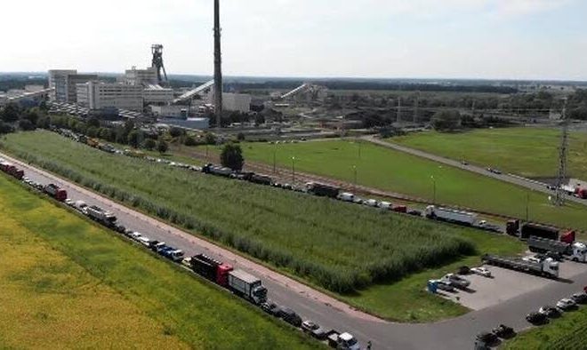 In Poland, where coal is king, homeowners queue for days to buy fuel